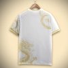 maillot-supporter-real-madrid-concept-premium-avec-motif-dragon-dore-edition-limitee Real Madrid fan jersey premium concept with golden dragon motif limited edition