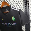 7FBB41CC1B27FB57A1EF7D4B8C7B6D2F_540x_f17aed9f-47b7-4596-a39c-a25c190fce10.jpg Real Madrid 2023-2024 Black Balmain Jersey