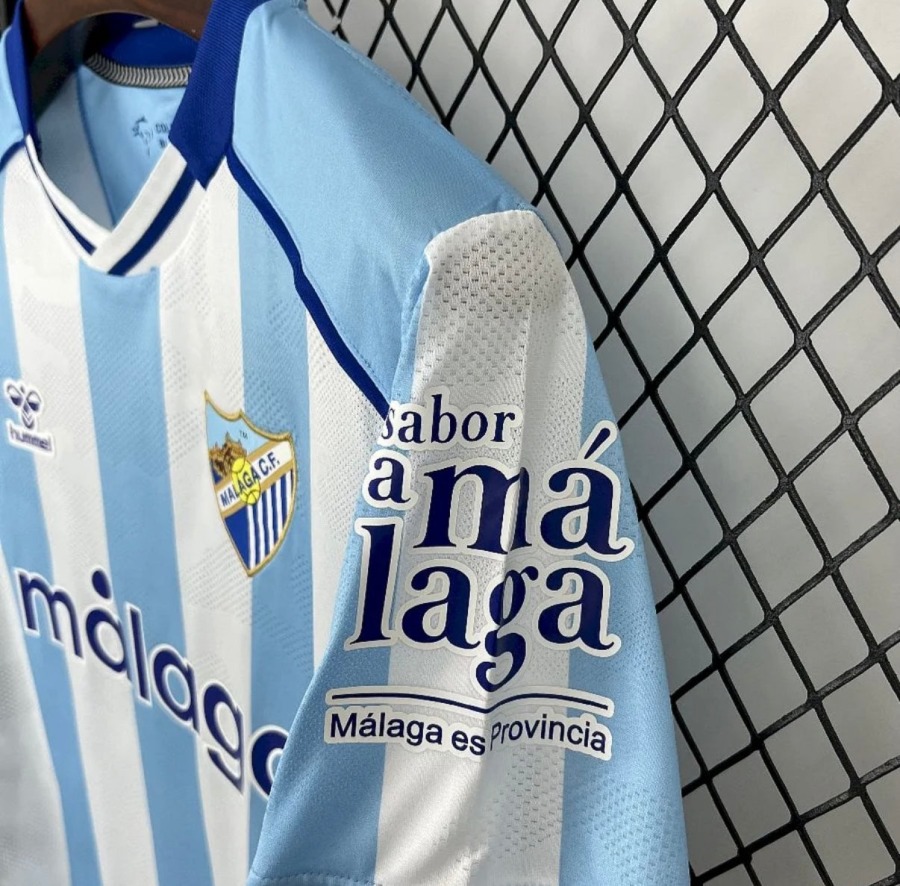 89189332-E323-42D5-8D81-CA31A9F4EC7A.jpg Malaga Home Jersey 2025/26